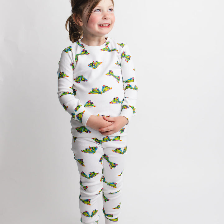 Child wearing Kids' Organic L/Sleeve PJ Set in Butterfly.