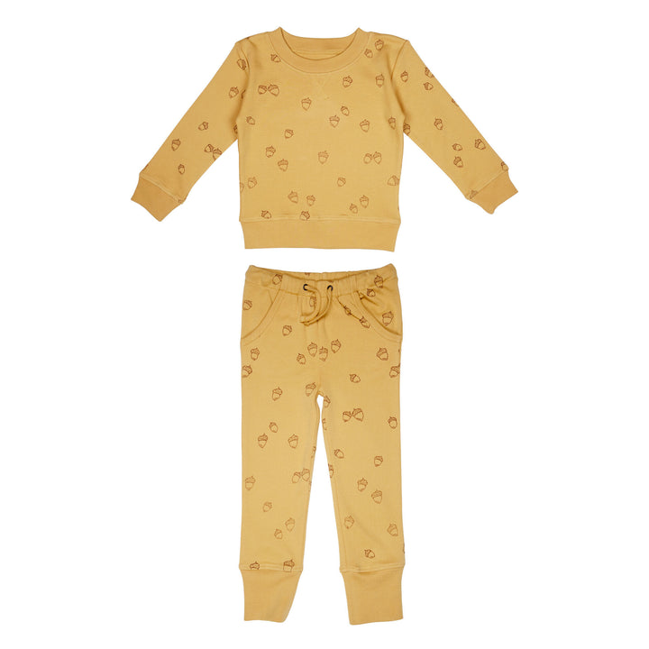 Kids' Printed Sweatshirt & Jogger Set in Honey Acorn, a mustard yellow fabric with brown printed acorns.