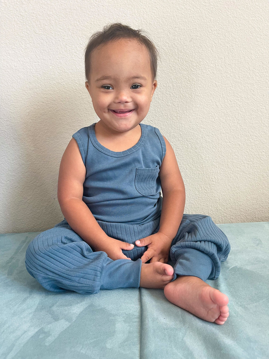Child wearing Kids' Ribbed Tank & Jogger Set in Dolphin.