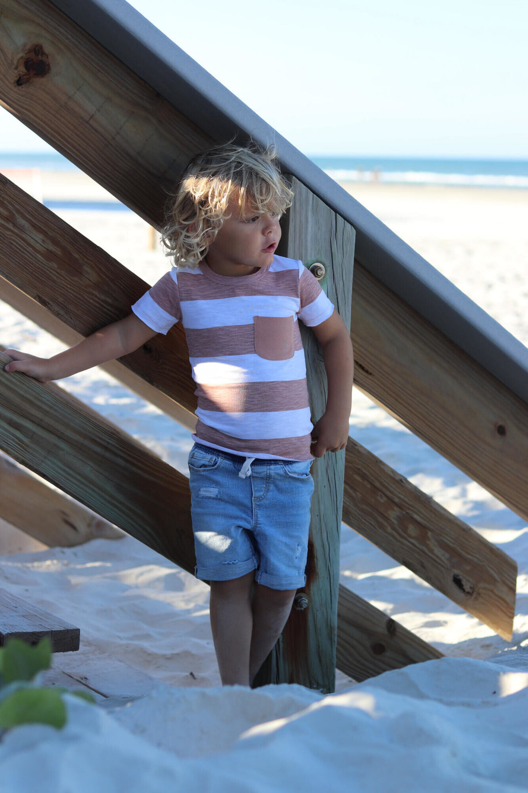 Child wearing Kids' Slub Jersey Crewneck Tee in Adobe Stripe.