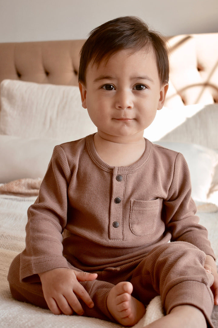 Child wearing Kids' Organic  Thermal Henley & Jogger Set in Cocoa.