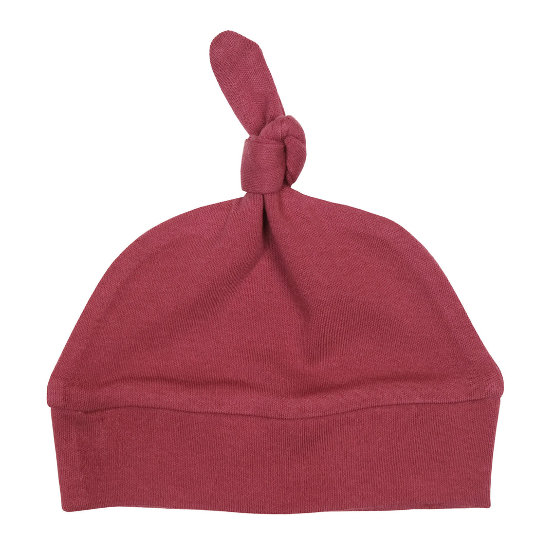 Organic Banded Top-Knot Hat in Appleberry, a dark, dusky pink color.