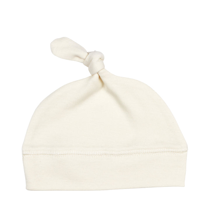 Organic Banded Top-Knot Hat in Buttercream, a light beige color.