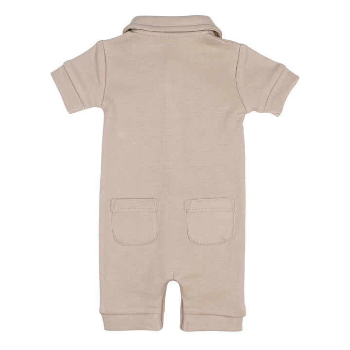 Back view of S/Sleeve Coverall in Oatmeal, a light tan color.