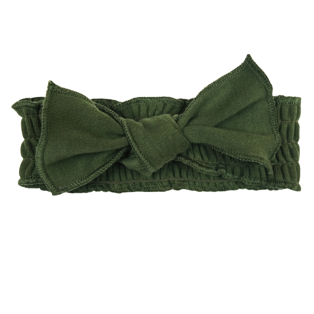 Organic Smocked Tie Headband in Forest, a deep green color.