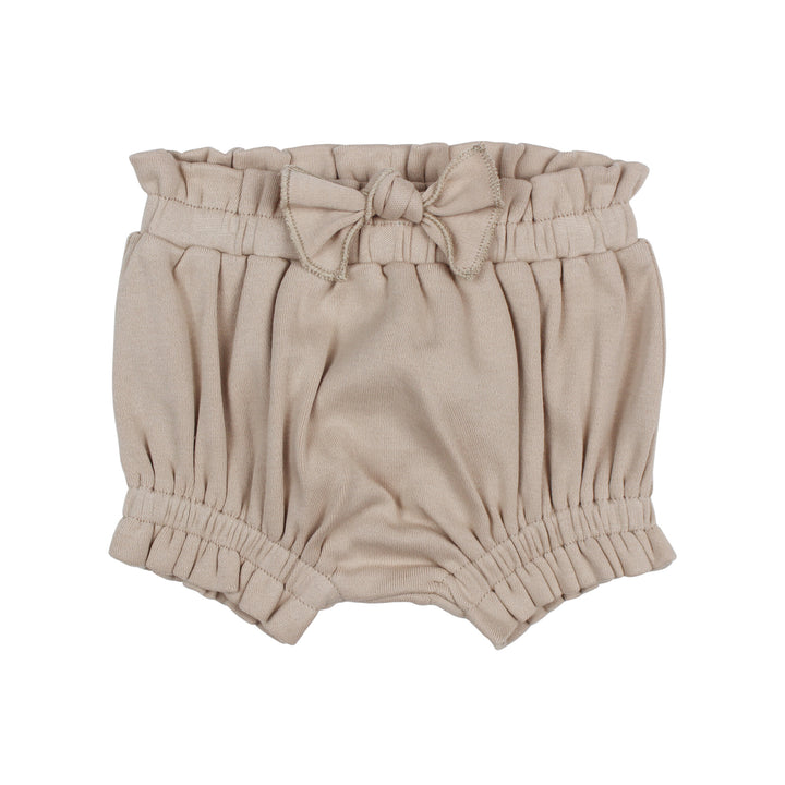 Ruffle Bloomer in Oatmeal, a light tan color.