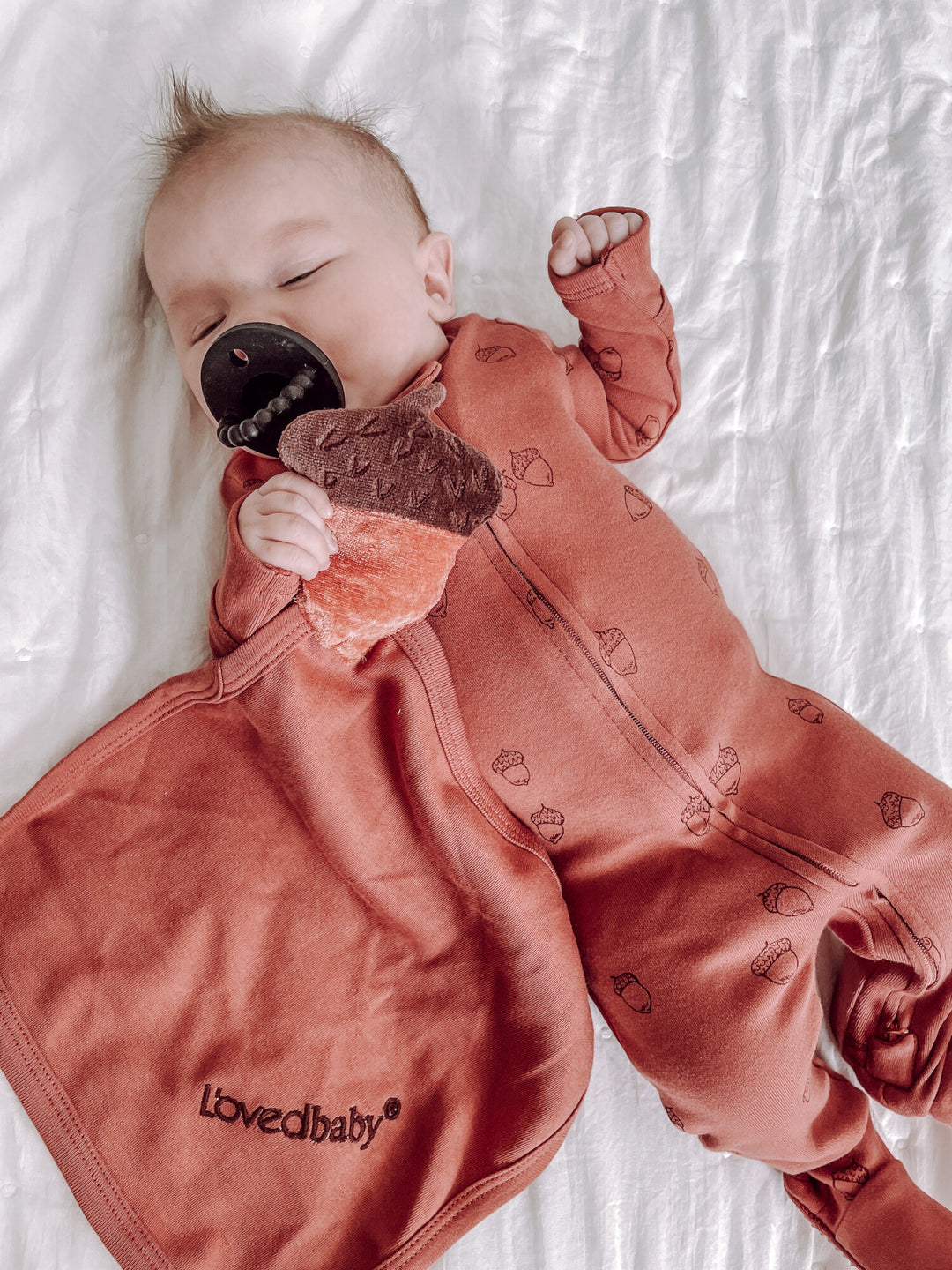 Child wearing Organic Cotton Lovey in Spice.