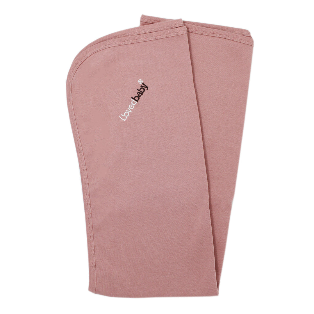 Blanket in Mauve, a medium pink color.