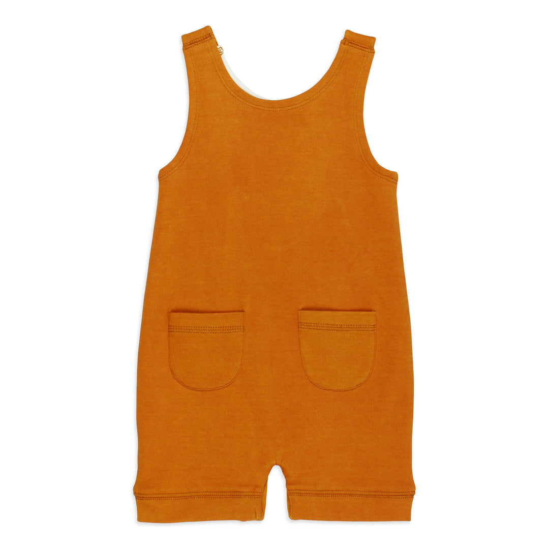 Back view of Organic Sleeveless Romper in Sunny Day.