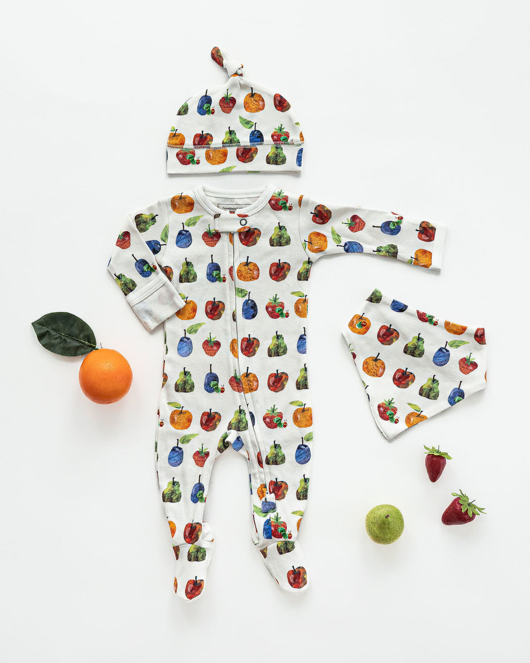Child wearing Organic 2-Way Zipper Footie in Fruit.