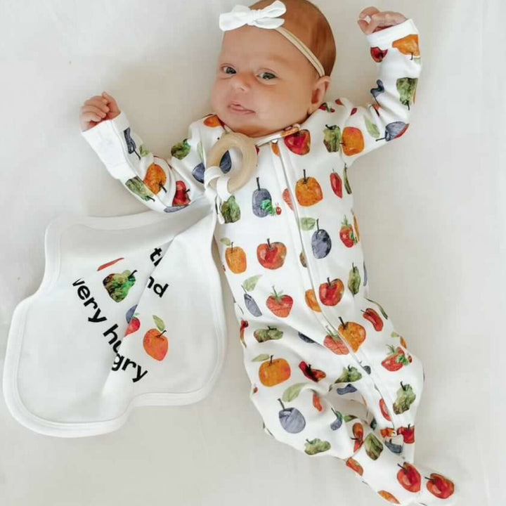 Child wearing Lovey & Book Bundle in Fruit.