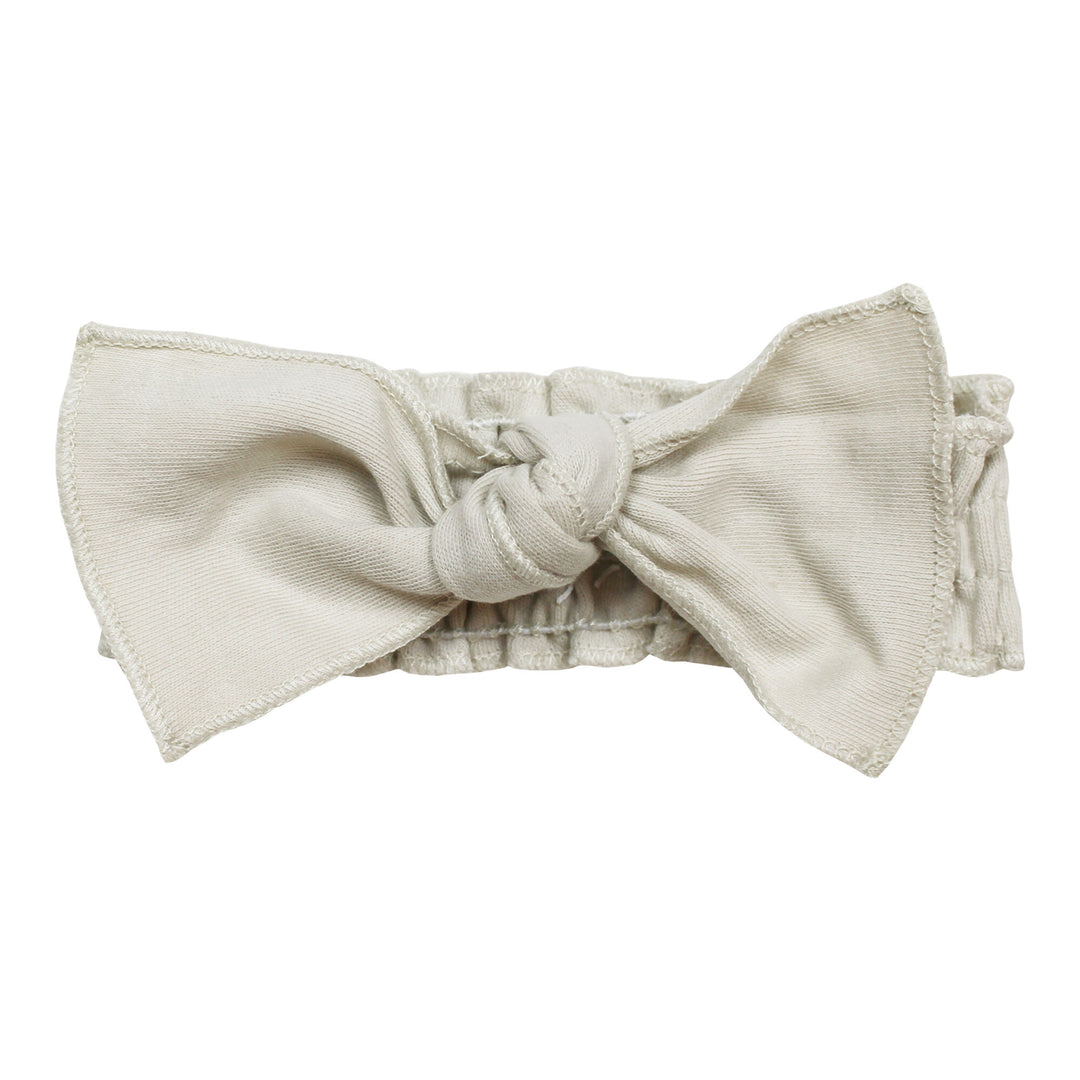 Smocked Headband in Stone, an off white color.