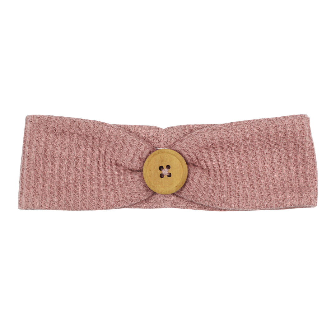 Organic Pique Button Headband in Mauve, a medium pink color.