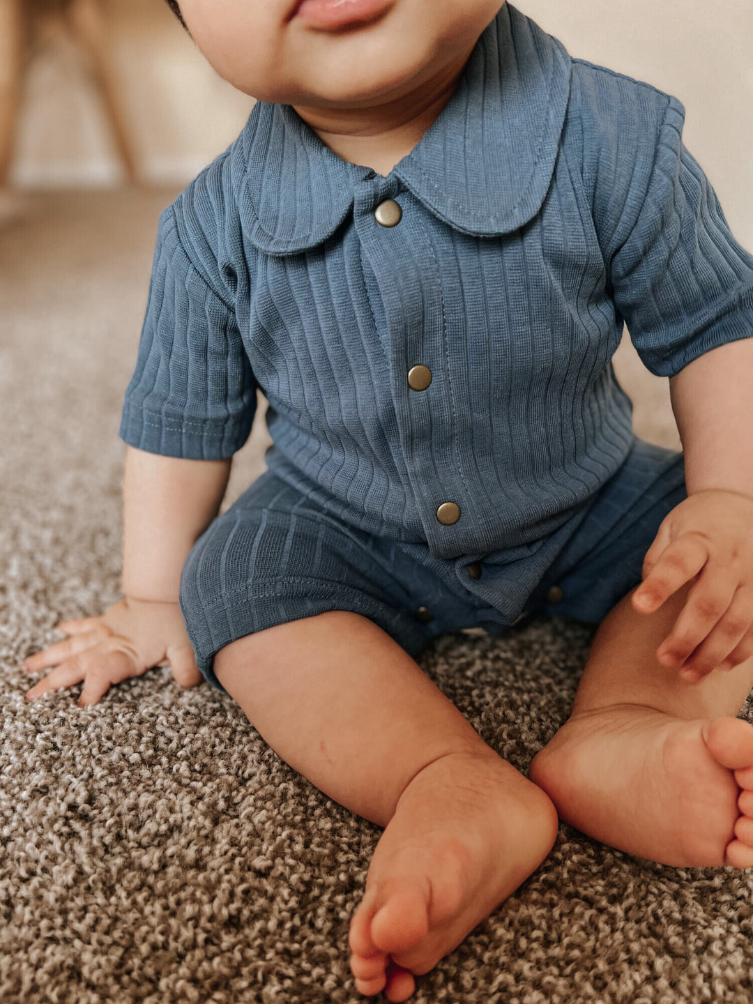 Child wearing Ribbed S/Sleeve Coverall in Dolphin.