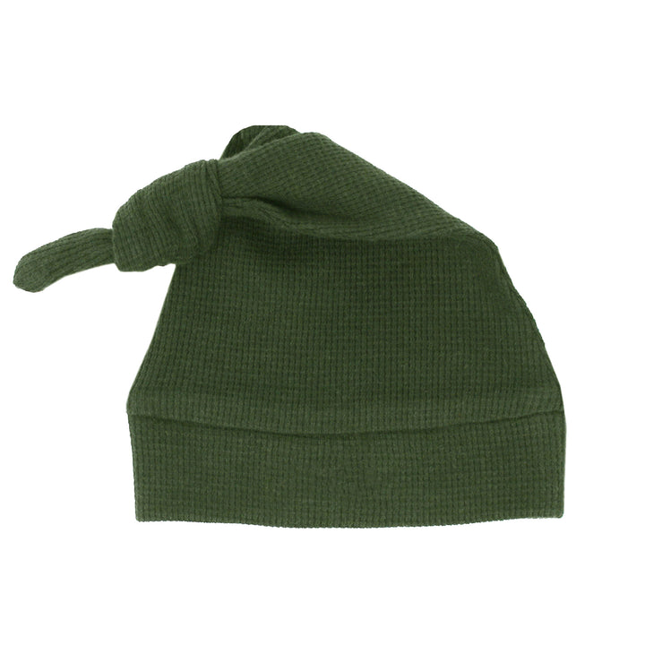 Organic Thermal Knotted Cap in Forest, a deep green color.