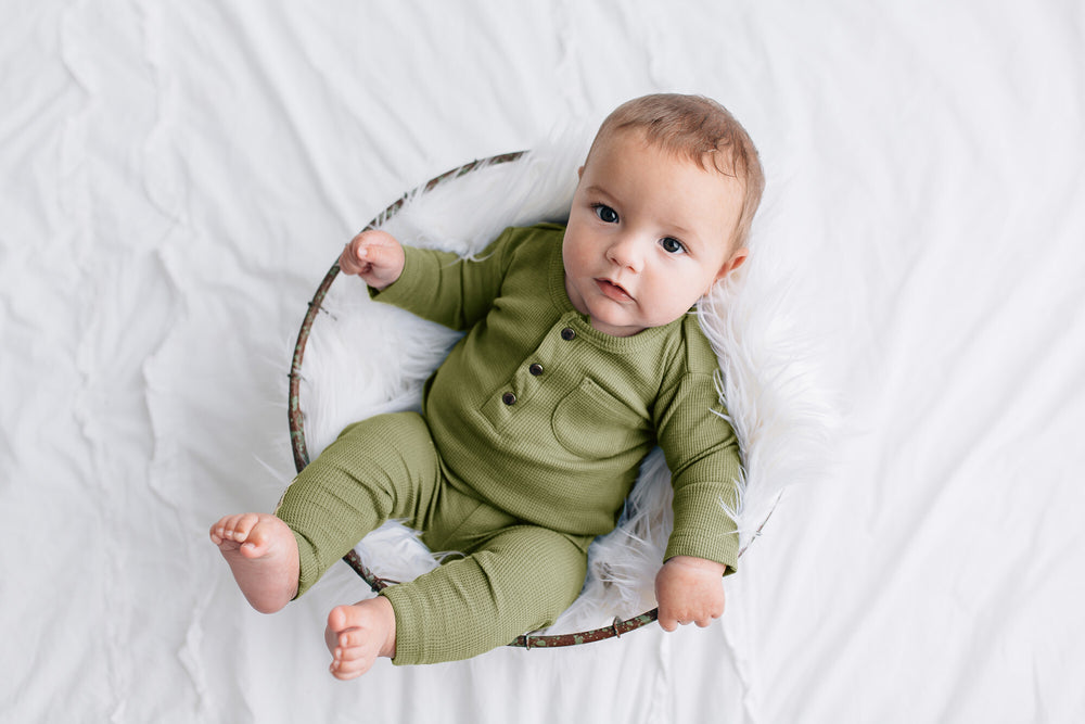 Child wearing Thermal Henley & Jogger Set in Sage.