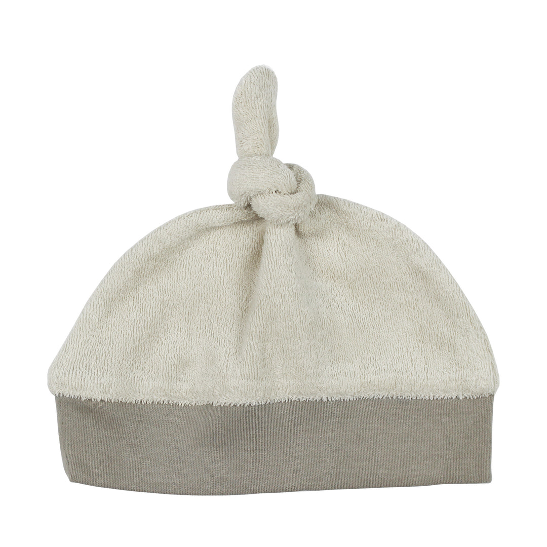 Organic Terry Cloth Banded Top-Knot Hat in Sand Castle, a medium tan color.