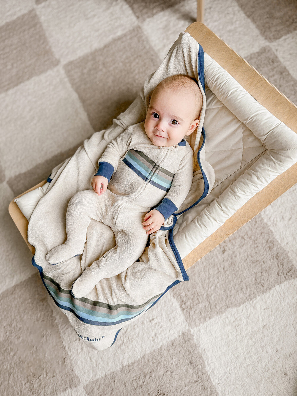 Child wearing Organic Terry Cloth 2-Way Zipper Footie in Blues.