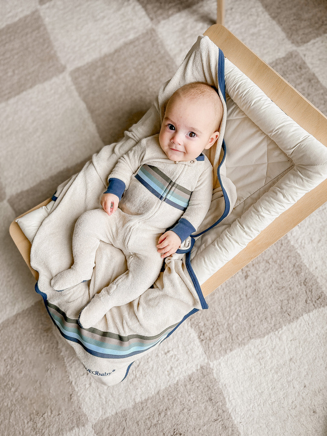 Child wearing Organic Terry Cloth 2-Way Zipper Footie in Blues.