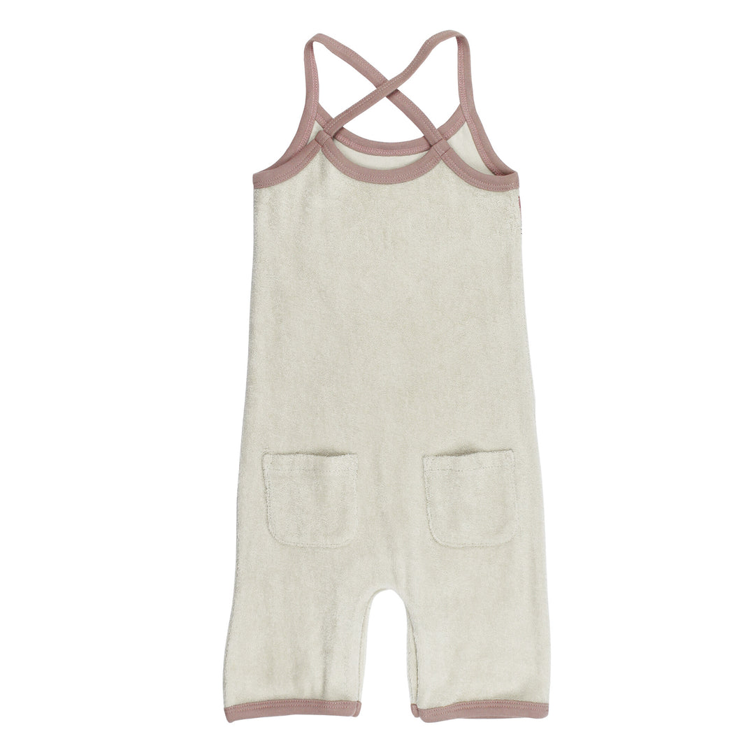 Back view of Organic Terry Cloth Overall in Pinks, a trio of light pink, salmon pink, and medium pink.