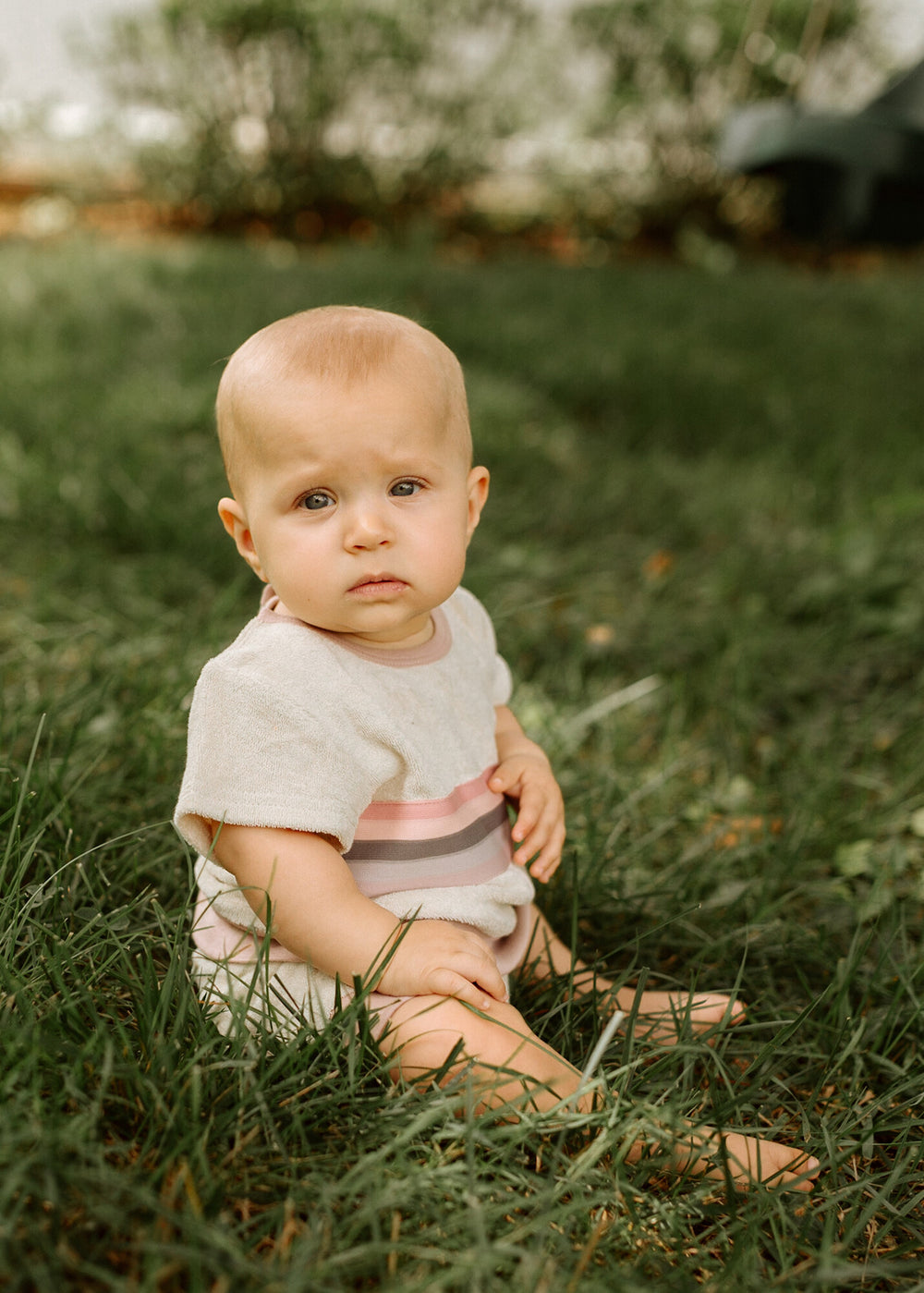 Child wearing Organic Terry Cloth Tee & Shortie Set in Pinks.