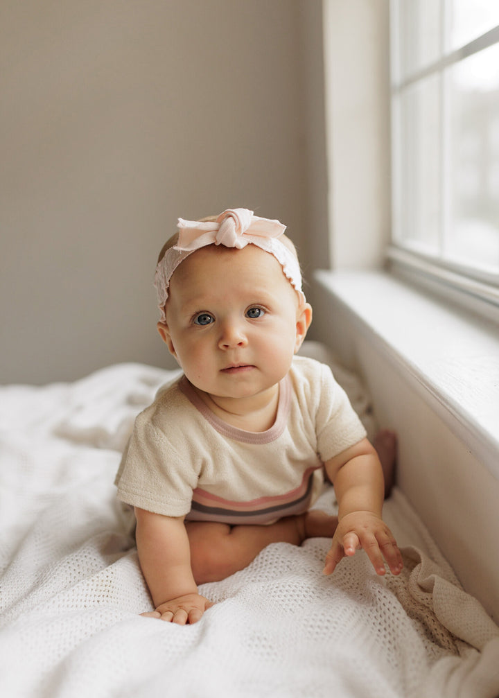 Child wearing Organic Terry Cloth Tee & Shortie Set in Pinks.