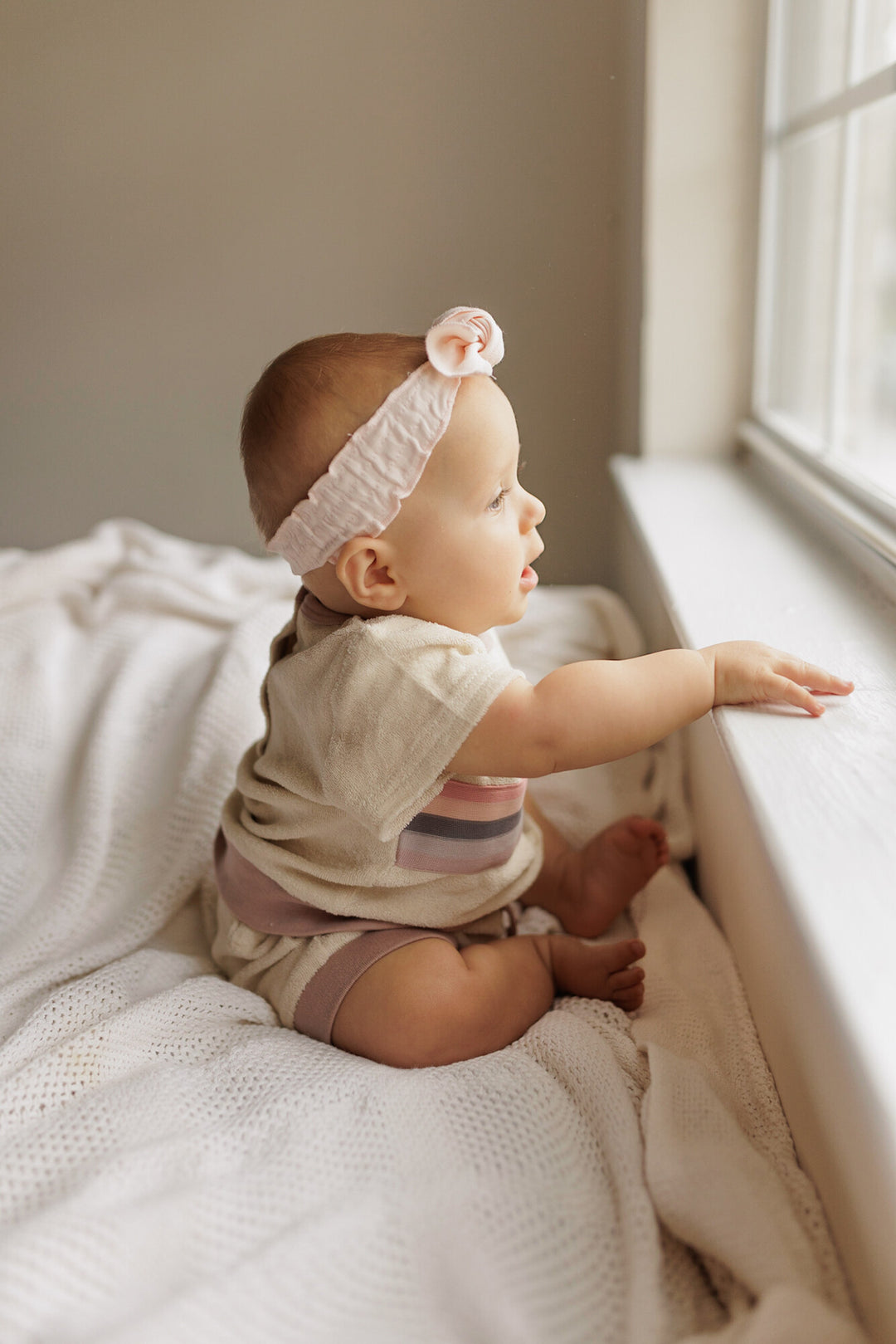 Child wearing Organic Terry Cloth Tee & Shortie Set in Pinks.
