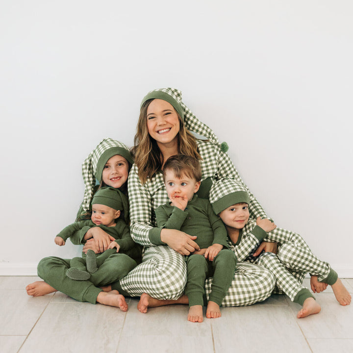 Child wearing Organic Holiday Women's 2-Pc Lounge Set with Cap in Christmas Eve Plaid.