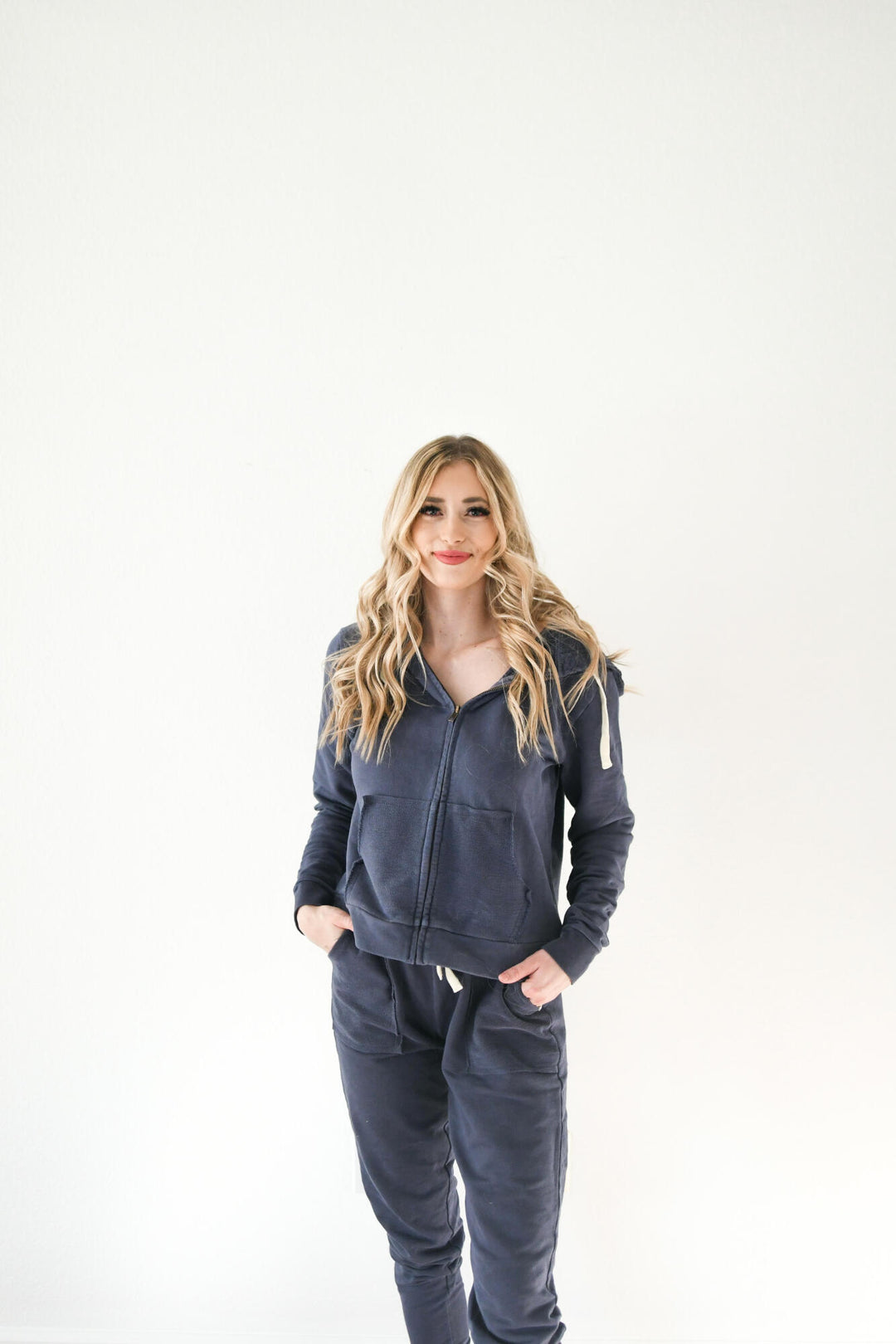 Woman wearing Women's French Terry Jogger Pants and Jacket in Indigo.