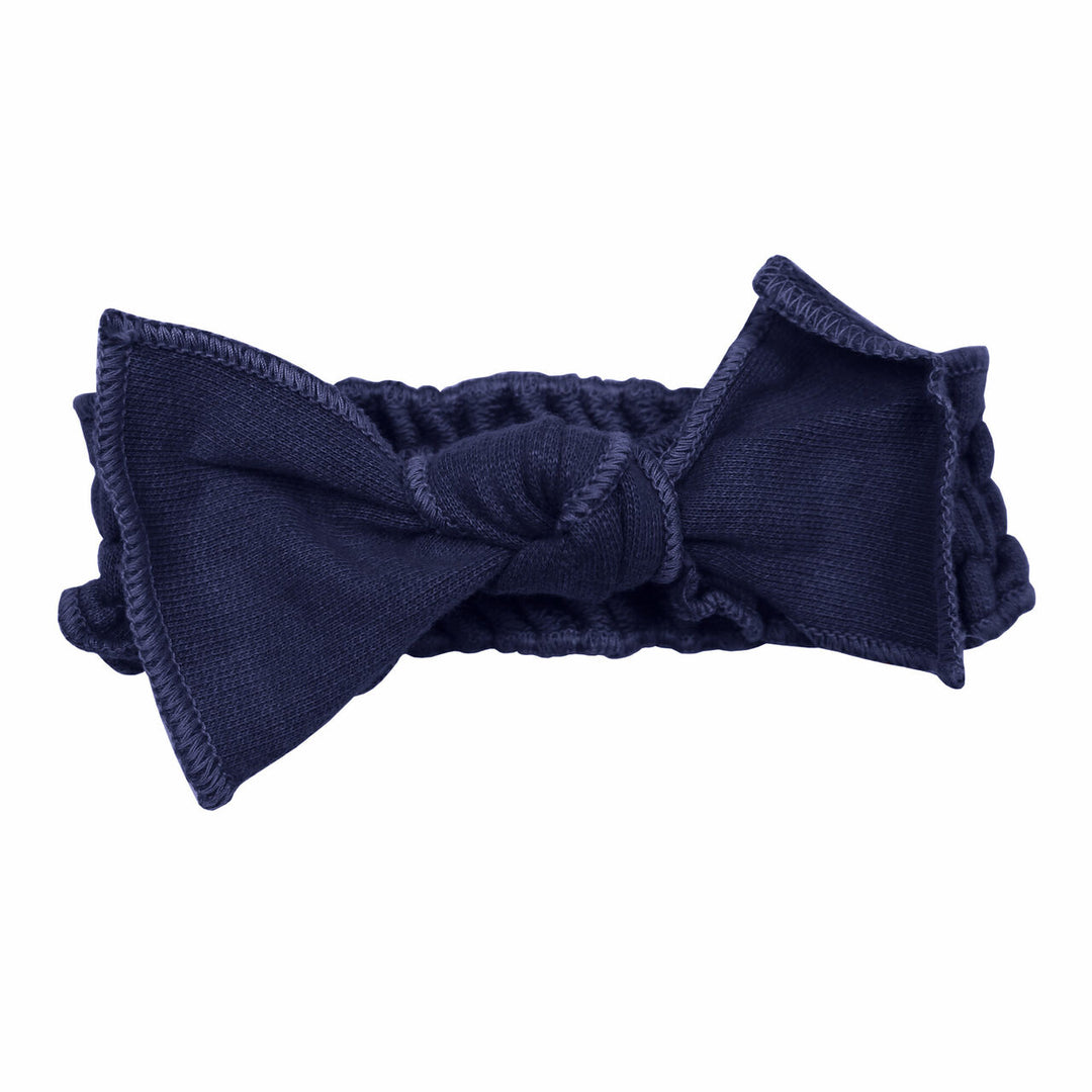 French Terry Smocked Headband in Indigo, a dark blue color.