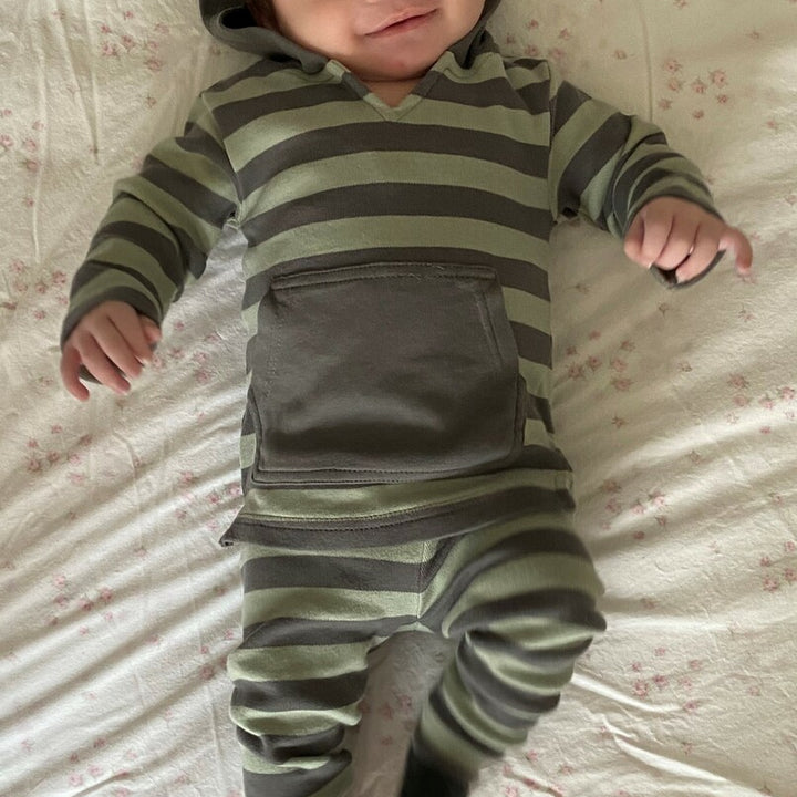 Child wearing Organic Hoodie in Gray/Seafoam Stripe. Credit: @devzsanchez 