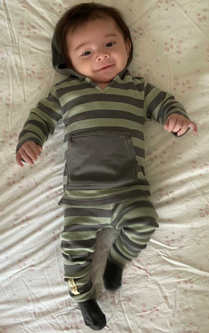 Child wearing Organic Hoodie in Gray/Seafoam Stripe. Credit: @devzsanchez 