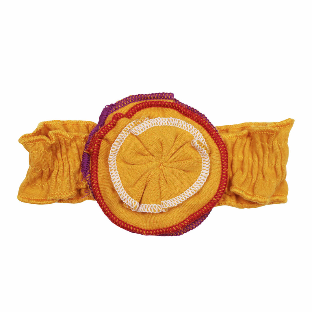Embroidered Flower Headband in Tangerine, a bright orange color.