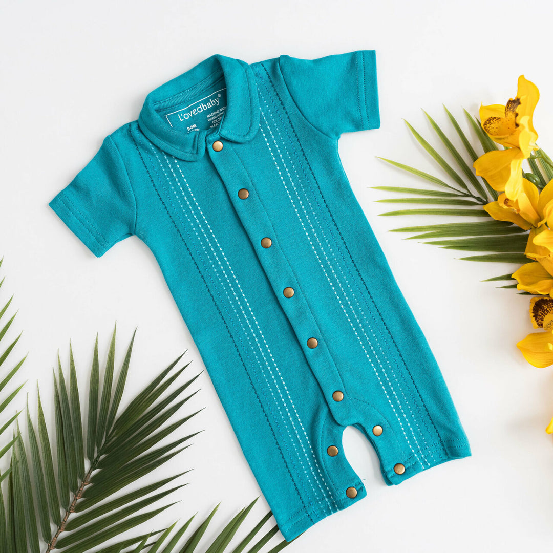 Child wearing Embroidered S/Sleeve Romper in Teal Dash.