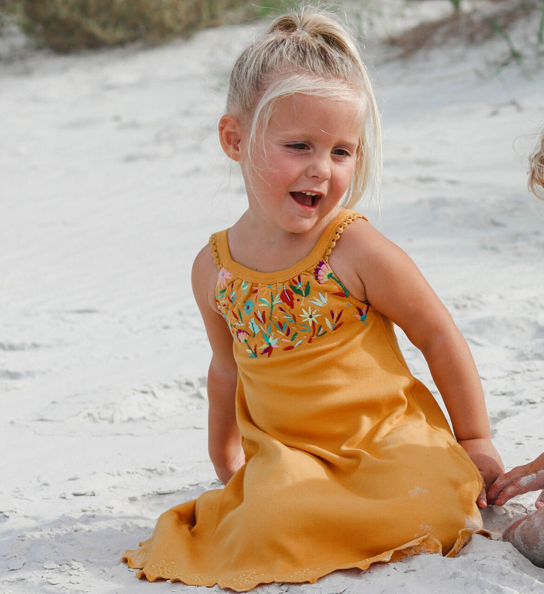 Child wearing Kids' Embroidered Twirl Dress w/Pockets in Tangerine Floral.