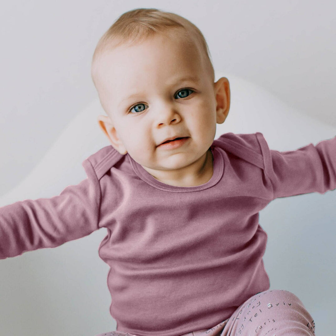 Child wearing Organic L/Sleeve Shirt in Lavender.
