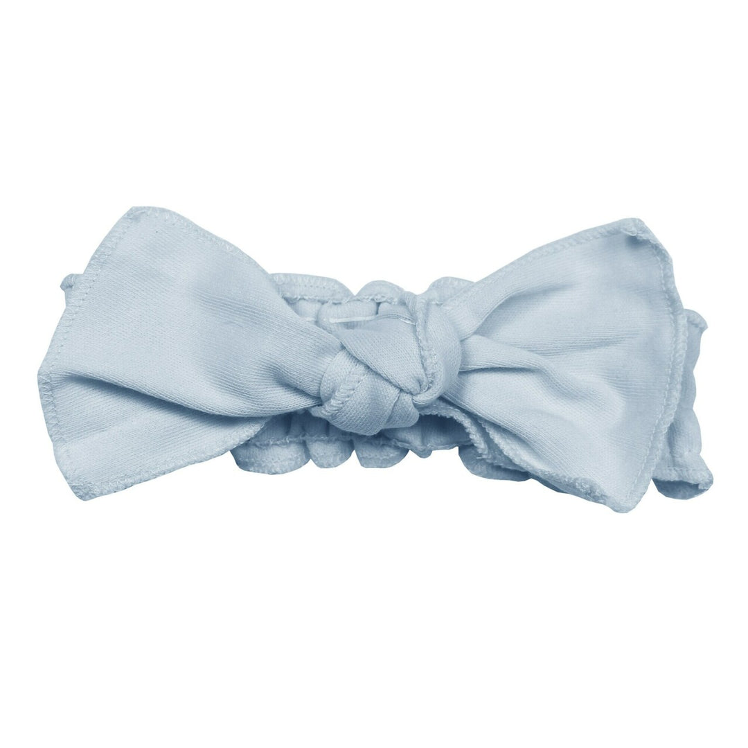 Organic Smocked Tie Headband in Moonbeam, a pale blue color.