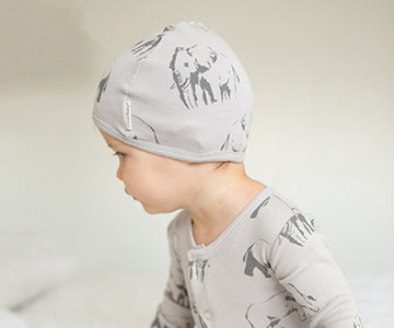 Child wearing Organic Cute Cap in Light Gray Elephant.