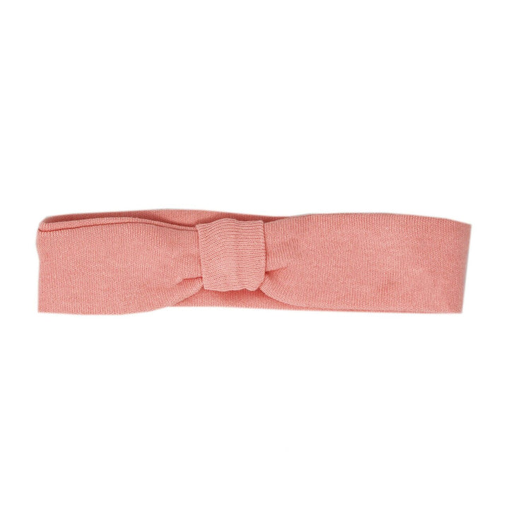 Organic Headband in Coral, a salmon pink color.