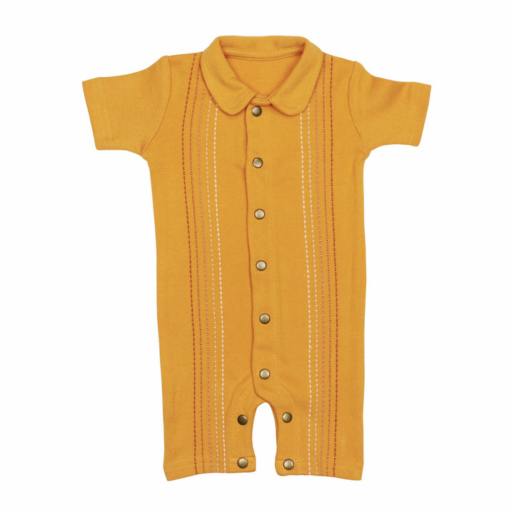 Embroidered S/Sleeve Romper in Tangerine Dash, an orange base fabric with light to dark orange embroiderred dashes.