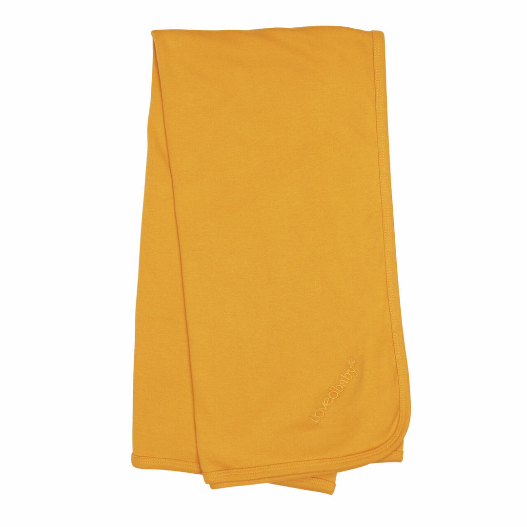 Organic Swaddling Blanket in Tangerine, a bright orange color.