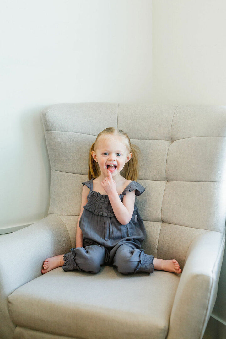Child wearing Organic Kids' Muslin Sleeveless Romper in Moonstone.