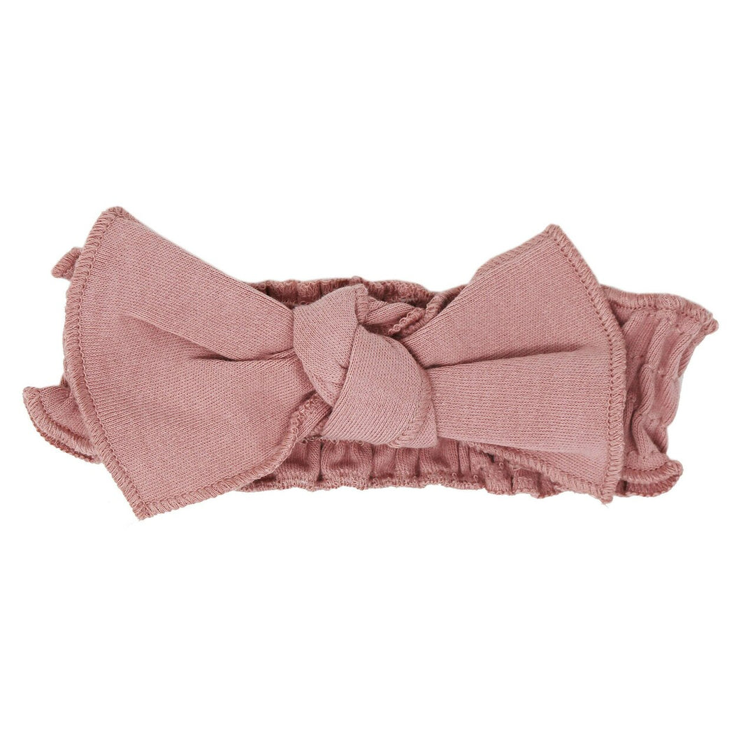 Organic Smocked Tie Headband in Mauve, a medium pink color.