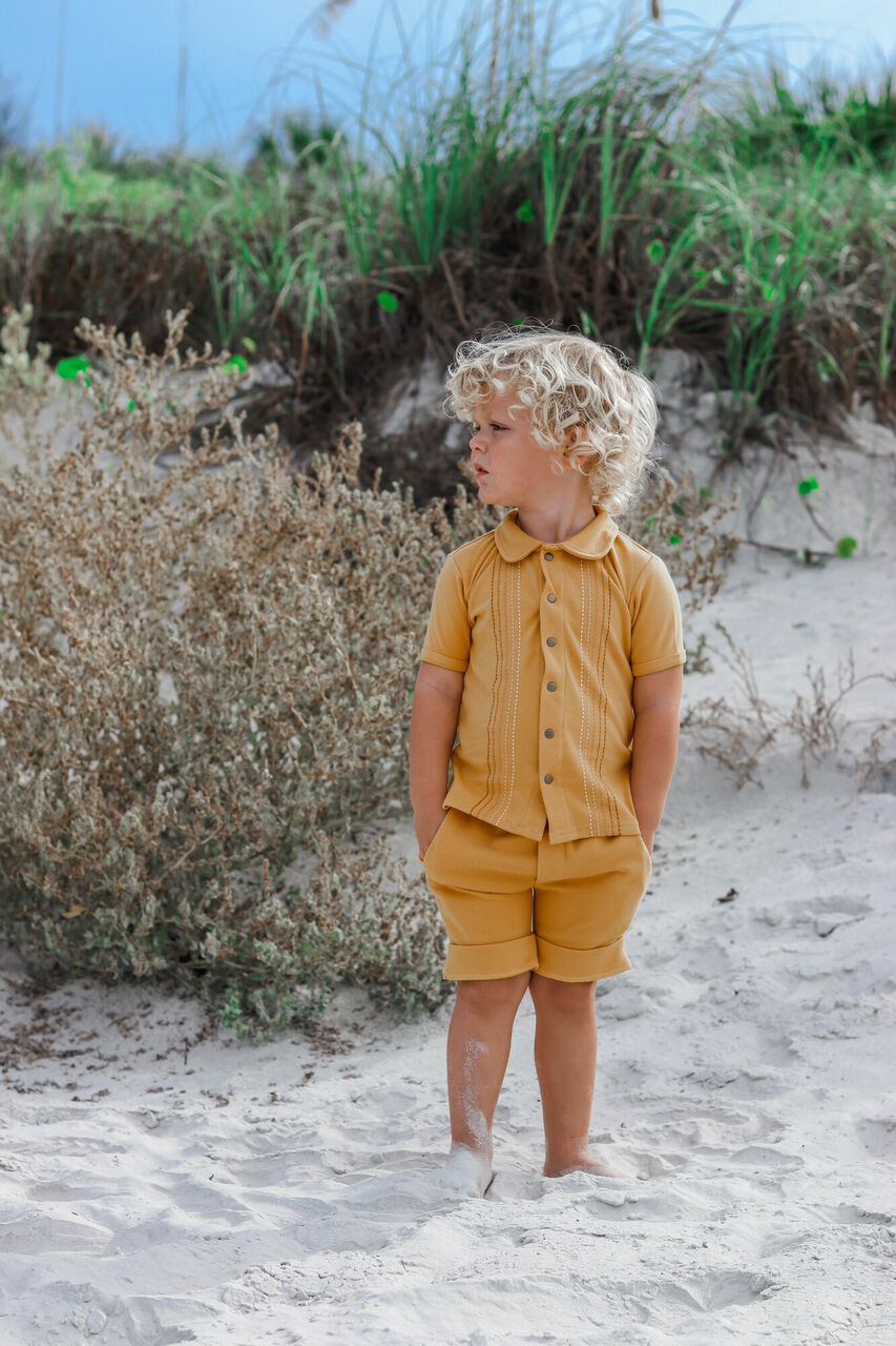 Child wearing Kids' Embroidered Shirt & Shorts Set in Tangerine Dash.