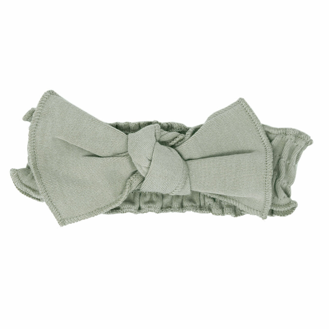Organic Smocked Tie Headband in Seafoam, a light green color.