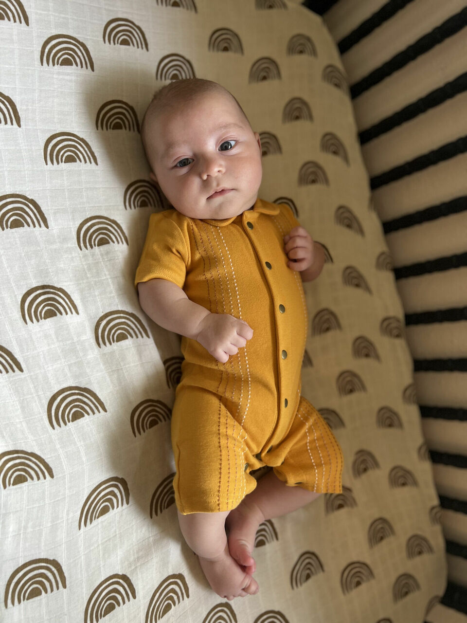 Child wearing Embroidered S/Sleeve Romper in Tangerine Dash.