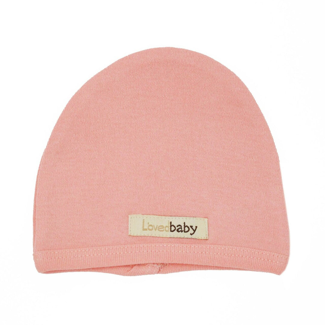 Organic Cute Cap in Coral, a salmon pink color.