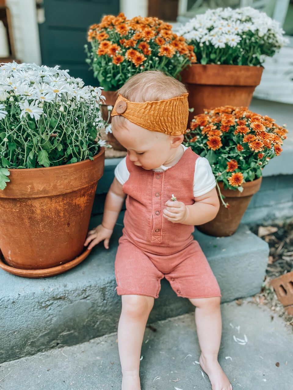 Child wearing French Terry 2-Sided Romper in Sienna.