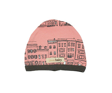 Organic Cute Cap in Coral City Block, a coral fabric with brownstone print.