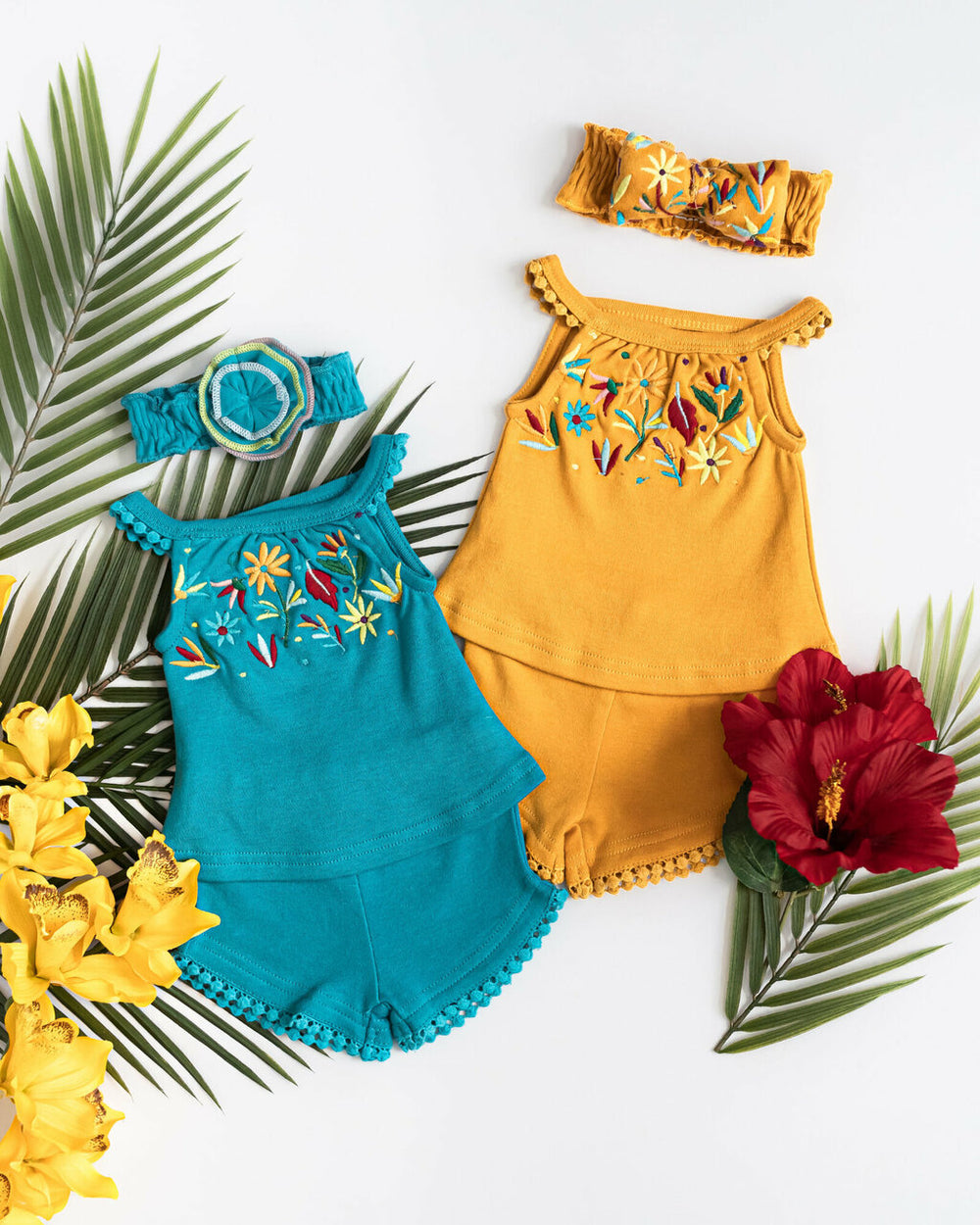 Child wearing Kids' Embroidered Tank & Tap Short Set in Teal Floral.